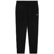 Pantalon Lacoste PANTALON DE SURVÊTEMENT EN TISSU DÉPERLANT NOIR