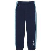 Pantalon enfant Lacoste PANTALON DE SURVÊTEMENT COLOR-BLOCK ENFANT BLE...