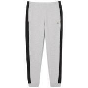 Pantalon Lacoste PANTALON DE SURVÊTEMENT FUSELÉ COLOR-BLOCK NOIR ET G