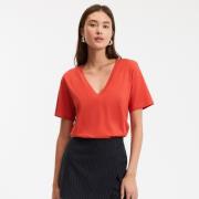 T-shirt loose col V, manches courtes